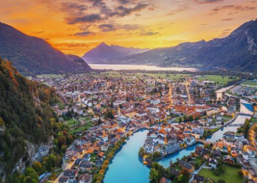 Paragliding Over Interlaken: Soaring Above the Swiss Alps